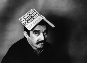 Gabriel Garcia Marquez with Book on Head